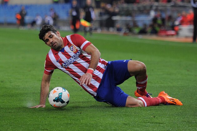 MADRID, SPAIN - MARCH 26:  Diego Costa of Club Atletico de Madrid takes a fall during the La Liga match between Club Atletico de Madrid and Granada CF at Vicente Calderon Stadium on March 26, 2014 in Madrid, Spain.  (Photo by Denis Doyle/Getty Images)
