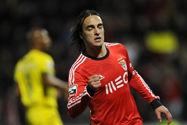 Benfica's Lazar Markovic, from Serbia, reacts as he celebrates after scoring his side's second goal against Pacos Ferreira in a Portuguese League soccer match at Mata Real stadium in Pacos de Ferreira, northern Portugal, Sunday, Feb. 16, 2014. (AP Photo/Paulo Duarte) Benfica's Lazar Markovic, from Serbia, reacts as he celebrates after scoring his side's second goal against Pacos Ferreira in a Portuguese League soccer match at Mata Real stadium in Pacos de Ferreira, northern Portugal, Sunday, Feb. 16, 2014. (AP Photo/Paulo Duarte)