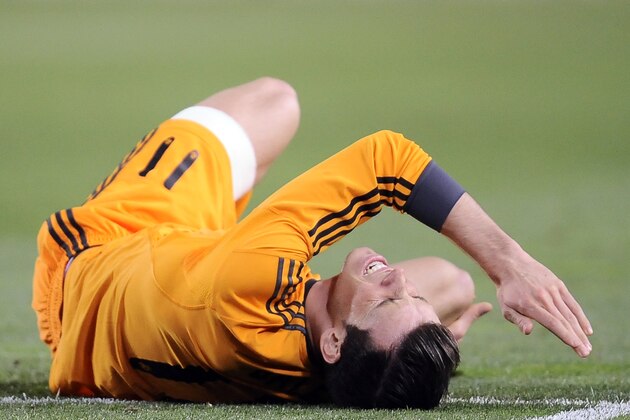 Real Madrid's Gareth Bale of Wales, laments on the pitch Real during their Spanish League soccer match against Real Sociedad, at Anoeta stadium, in San Sebastian, Spain, Saturday, April 5, 2014. (AP Photo/Alvaro Barrientos)