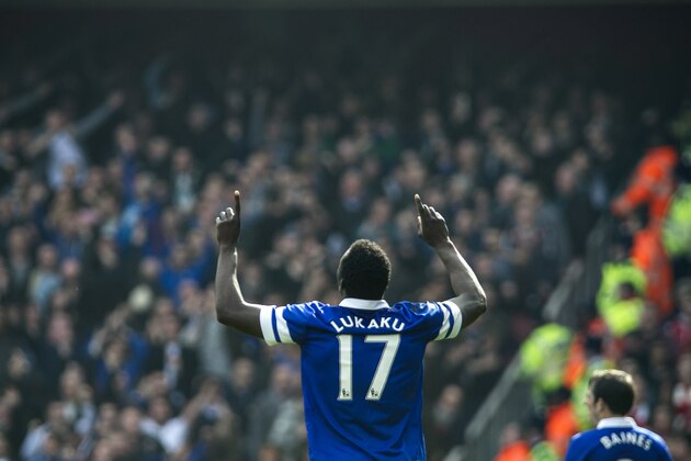 Everton's Romelu Lukaku celebrates after scoring against Arsenal, during their FA Cup quarterfinal soccer match, at Emirates Stadium, in London, Saturday, March 8, 2014. (AP Photo/Bogdan Maran)