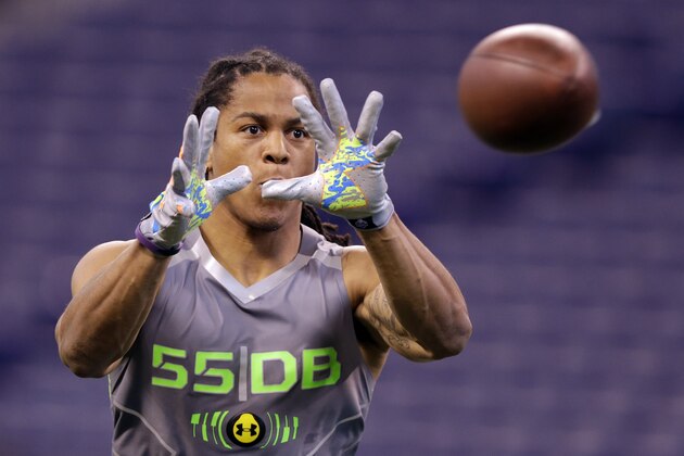 Texas Christian defensive back Jason Verrett makes a catch as he runs a drill at the NFL football scouting combine in Indianapolis, Tuesday, Feb. 25, 2014. (AP Photo/Michael Conroy)