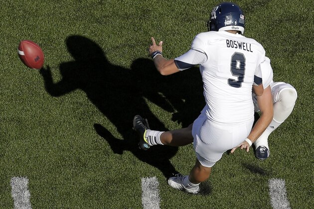 Rice's Chris Boswell kicks a 29-yard field goal during the second half of an NCAA college football game against Kansas Saturday, Sept. 8, 2012, in Lawrence, Kan. Rice won the game 25-24. (AP Photo/Charlie Riedel)
