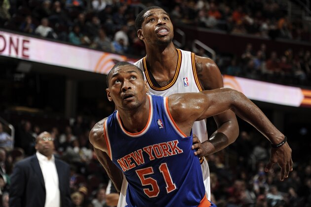 CLEVELAND, OH - DECEMBER 7:  Metta World Peace #51 of the New York Knicks boxes out Tristan Thompson #13 of the Cleveland Cavaliers for the rebound at The Quicken Loans Arena on December 7, 2013 in Cleveland, Ohio. NOTE TO USER: User expressly acknowledges and agrees that, by downloading and/or using this Photograph, user is consenting to the terms and conditions of the Getty Images License Agreement. Mandatory Copyright Notice: Copyright 2013 NBAE (Photo by David Liam Kyle/NBAE via Getty Images)