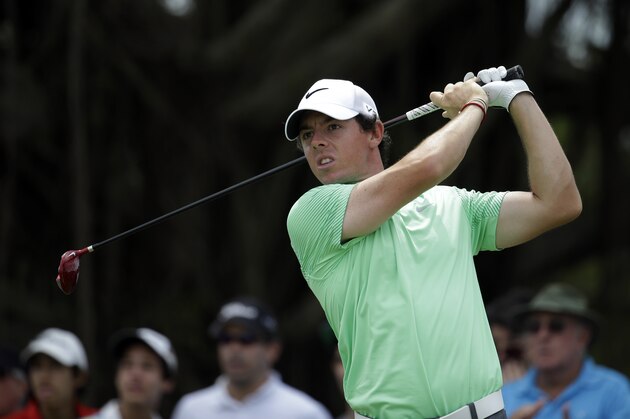 Rory McIlroy of Northern Ireland tees off on the fourth hole during the final round of the Cadillac Championship golf tournament Sunday, March 9, 2014, in Doral, Fla. (AP Photo/Lynne Sladky)
