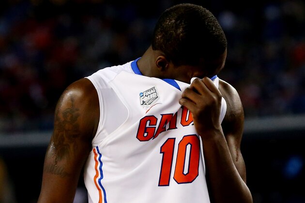 ARLINGTON, TX - APRIL 05:  Dorian Finney-Smith #10 of the Florida Gators walks off the court after losing 63-53 to the Connecticut Huskies in the NCAA Men's Final Four Semifinal at AT&T Stadium on April 5, 2014 in Arlington, Texas.  (Photo by Ronald Martinez/Getty Images)