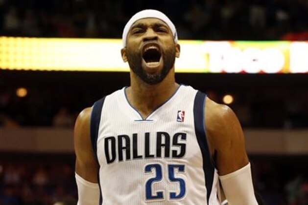 Dallas Mavericks guard/forward Vince Carter (25) shouts after scoring the final points of Dallas' 103-98 win in an NBA basketball game against the Portland Trail Blazers on Friday, March 7, 2014, in Dallas. (AP Photo/John F. Rhodes)