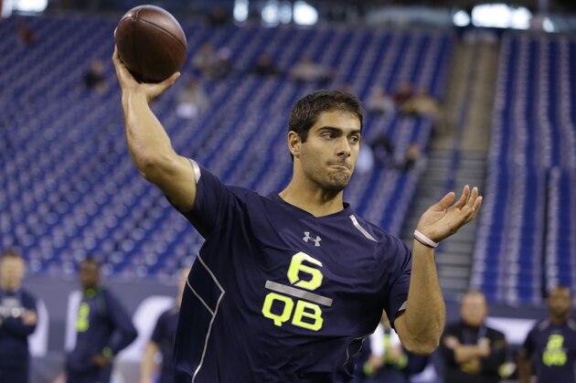 Eastern Illinois quarterback Jimmy Garoppolo throws during a drill at the NFL football scouting combine in Indianapolis, Sunday, Feb. 23, 2014. (AP Photo/Michael Conroy)