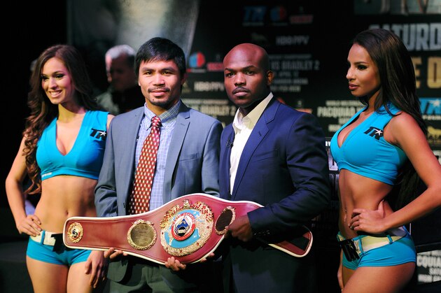 NEW YORK, NY - FEBRUARY 06: Manny Pacquiao (2nd L) and Timothy Bradley stand for photos during the press conference to promote their upcoming WBO welterweight champtionship rematch at New World Stages on February 6, 2014 in New York City.  (Photo by Maddie Meyer/Getty Images)