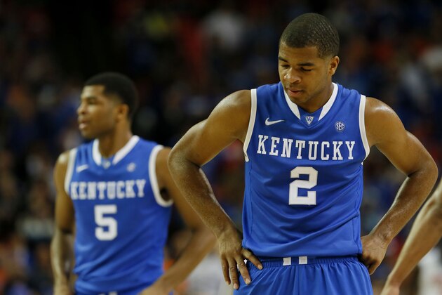 ATLANTA, GA - MARCH 16:  Aaron Harrison #2 and Andrew Harrison #5 of the Kentucky Wildcats react in the first half against the Florida Gators during the Championship game of the 2014 Men's SEC Basketball Tournament at Georgia Dome on March 16, 2014 in Atlanta, Georgia.  (Photo by Kevin C. Cox/Getty Images)
