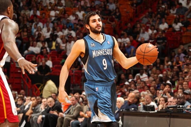 MIAMI, FL - April 4: Ricky Rubio #9 of the Minnesota Timberwolves dribbles up the court against the Miami Heat at the American Airlines Arena in Miami, Florida on April, 4 2014. NOTE TO USER: User expressly acknowledges and agrees that, by downloading and/or using this photograph, user is consenting to the terms and conditions of the Getty Images License Agreement. Mandatory copyright notice: Copyright NBAE 2014 (Photo by Issac Baldizon/NBAE via Getty Images)