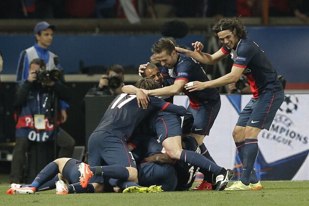 PSG players celebrates after Javier Pastore scored his sides 3rd goal during the Champions League quarterfinal first leg soccer match between PSG and Chelsea, at the Parc des Princes stadium, in Paris, Wednesday, April 2, 2014. (AP Photo/Christophe Ena)