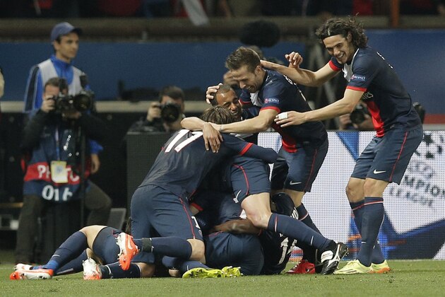 PSG players celebrates after Javier Pastore scored his sides 3rd goal during the Champions League quarterfinal first leg soccer match between PSG and Chelsea, at the Parc des Princes stadium, in Paris, Wednesday, April 2, 2014. (AP Photo/Christophe Ena)