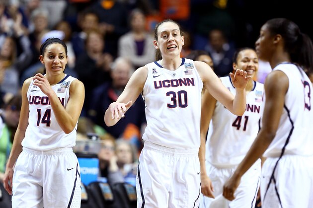 NASHVILLE, TN - APRIL 06:  Breanna Stewart #30 of the Connecticut Huskies smiles with teammates late in the game against the Stanford Cardinal during the NCAA Women's Final Four semifinal at Bridgestone Arena on April 6, 2014 in Nashville, Tennessee.  (Photo by Andy Lyons/Getty Images)