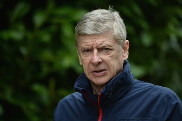 ST ALBANS, ENGLAND - MARCH 10:  Arsenal manager Arsene Wenger looks on during the Arsenal training session at London Colney on March 10, 2014 in St Albans, England.  (Photo by Michael Regan/Getty Images)