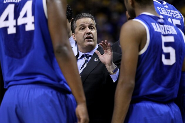 ST LOUIS, MO - MARCH 23:  Head coach John Calipari of the Kentucky Wildcats talks to his team against the Wichita State Shockers during the third round of the 2014 NCAA Men's Basketball Tournament at Scottrade Center on March 23, 2014 in St Louis, Missouri.  (Photo by Andy Lyons/Getty Images)