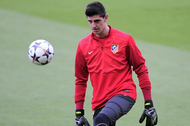 Atletico Madrid's goalkeeper Thibaut Courtois attends a training session at the Camp Nou stadium in Barcelona, Spain, Monday, March 31, 2014. FC Barcelona will face Atletico Madrid in a first leg quarter-final Champions League soccer match April 1. (AP Photo/Manu Fernandez)