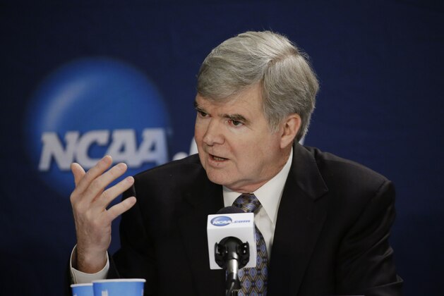 NCAA President Mark Emmert answers a question at a news conference Sunday, April 6, 2014, in Arlington, Texas. (AP Photo/David J. Phillip)