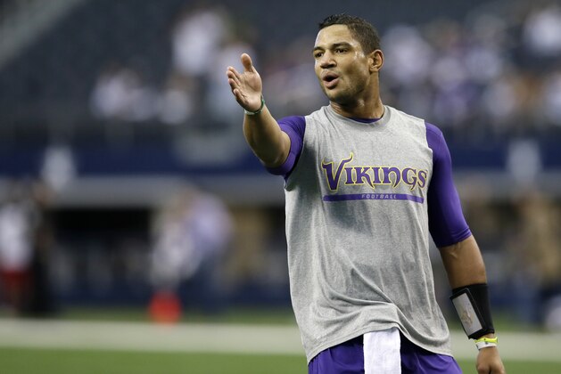 Minnesota Vikings quarterback Josh Freeman warms up during before an NFL football game against the Dallas Cowboys Sunday, Nov. 3, 2013, in Arlington, Texas. (AP Photo/Tim Sharp)