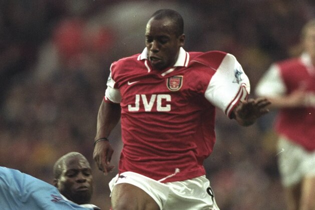 26 Oct 1997: Ian Wright of Arsenal is tackled by Ugo Ehiogu of Aston Villa (right) during the FA Carling Premiership match at Highbury in London. The match was drawn 0-0. \ Mandatory Credit: Ben Radford /Allsport 26 Oct 1997: Ian Wright of Arsenal is tackled by Ugo Ehiogu of Aston Villa (right) during the FA Carling Premiership match at Highbury in London. The match was drawn 0-0. \ Mandatory Credit: Ben Radford /Allsport