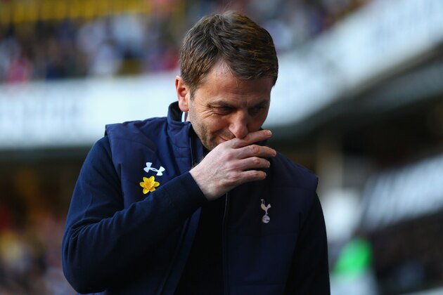 LONDON, ENGLAND - MARCH 16:  Tim Sherwood manager of Tottenham Hotspur wipes his face during the Barclays Premier League match between Tottenham Hotspur and Arsenal at White Hart Lane on March 16, 2014 in London, England.  (Photo by Paul Gilham/Getty Images)