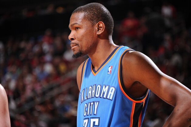 HOUSTON, TX - APRIL 4:  Kevin Durant #35 of the Oklahoma City Thunder reacts to a play against the Houston Rockets on April 4, 2014 at the Toyota Center in Houston, Texas. NOTE TO USER: User expressly acknowledges and agrees that, by downloading and or using this photograph, User is consenting to the terms and conditions of the Getty Images License Agreement. Mandatory Copyright Notice: Copyright 2014 NBAE (Photo by Bill Baptist/NBAE via Getty Images)