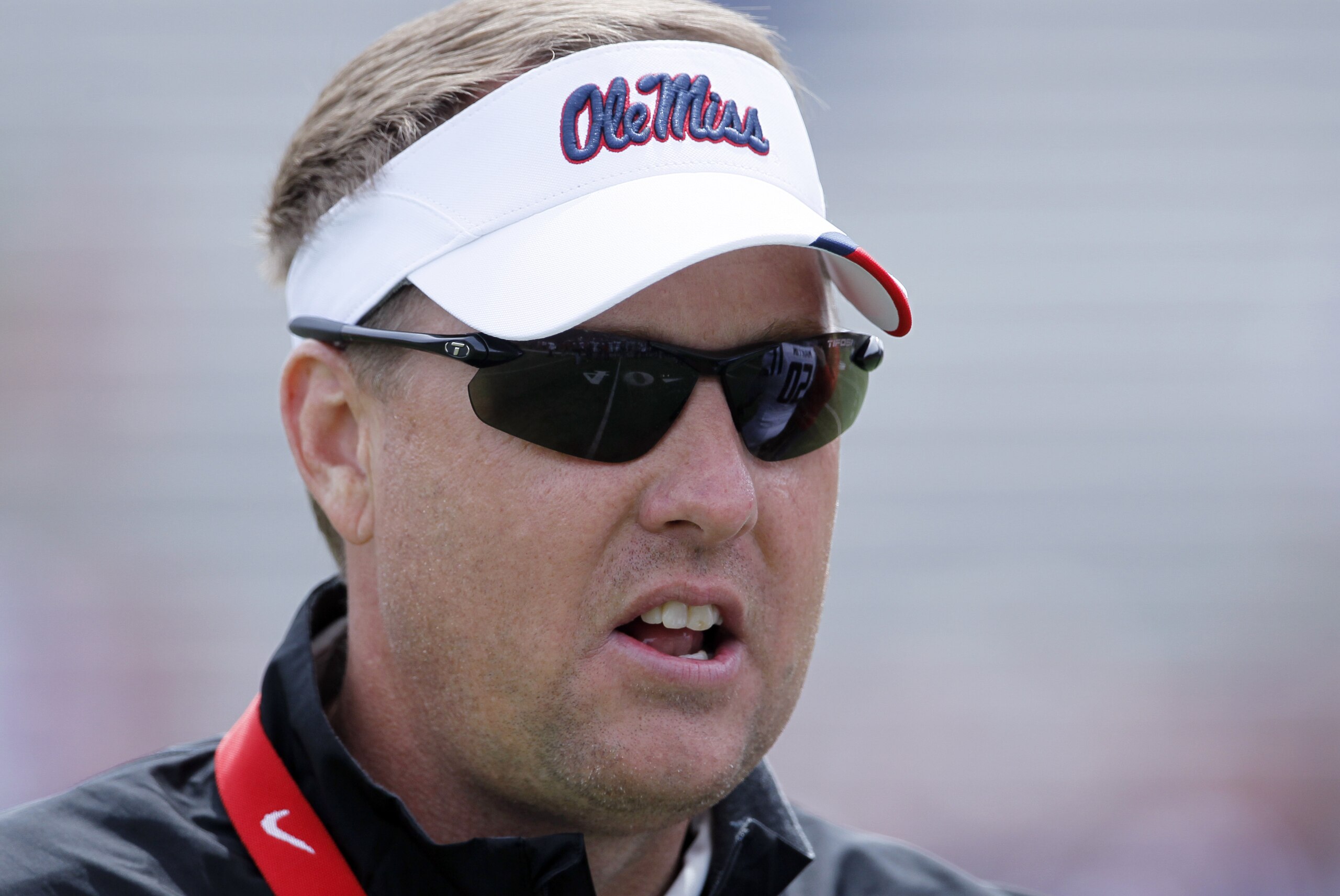 Mississippi football coach Hugh Freeze calls out to his players during their team's NCAA college football spring scrimmage on Saturday, April 5, 2014, in Oxford, Miss. (AP Photo/Rogelio V. Solis)