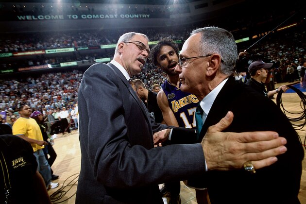 PHILADELPHIA - 2001:  Rick Fox #17 and Head Coach Phil Jackson of the Los Angeles Lakers talks to Head Coach Larry Brown of the Philadelphia 76ers after the game circa 2001 in Philadelphia, Pennsylvania. NOTE TO USER: User expressly acknowledges and agrees that, by downloading and/or using this Photograph, User is consenting to the terms and conditions of the Getty Images License Agreement.  Mandatory Copyright Notice:  Copyright 2001 NBAE. (Photo by Andrew D. Bernstein/NBAE via Getty Images)