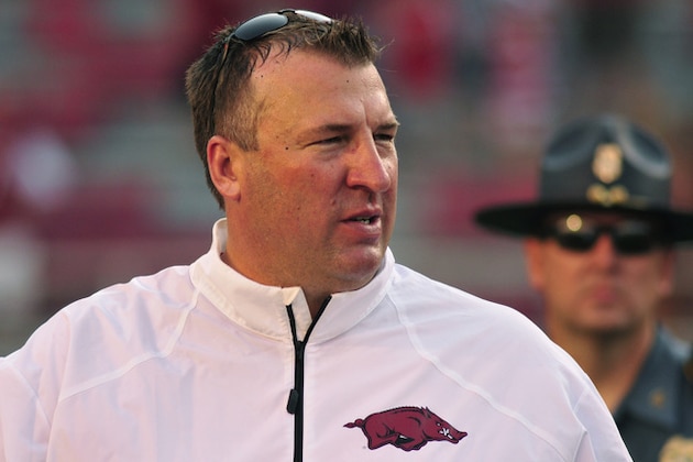 Arkansas coach Bret Bielema wayches from the sidelines during the second half of an NCAA college football game against Louisiana-Lafayette in Fayetteville, Ark., Saturday, Aug. 31, 2013. Arkansas defeated Louisiana-Lafayette 34-14. (AP Photo/April L Brown)