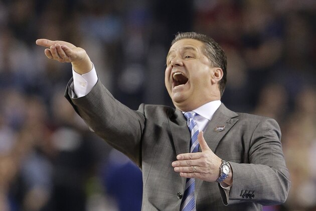 Kentucky head coach John Calipari reacts during the first half of an NCAA Final Four tournament college basketball semifinal game against Wisconsin Saturday, April 5, 2014, in Arlington, Texas. (AP Photo/Eric Gay)