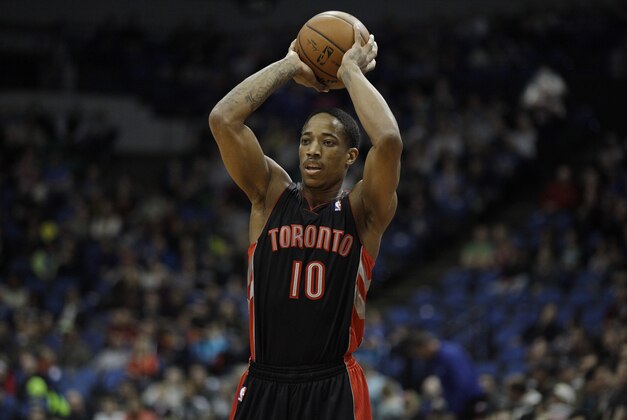 Toronto Raptors guard DeMar DeRozan (10) looks to pass the ball in the first half of an NBA basketball game against the Minnesota Timberwolves, Sunday, March 9, 2014, in Minneapolis. The Raptors won 111-104. (AP Photo/Stacy Bengs)