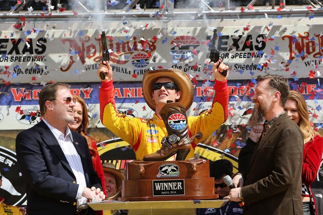 FORT WORTH, TX - APRIL 07:  Joey Logano, driver of the #22 Shell-Pennzoil/Hertz Ford, celebrates in Victory Lane with Texas Motor Speedway President Eddie Gossage (L) during the NASCAR Nationwide Series O'Reilly Auto Parts 300 at Texas Motor Speedway on April 4, 2014 in Fort Worth, Texas.  (Photo by Jerry Markland/Getty Images for Texas Motor Speedway)