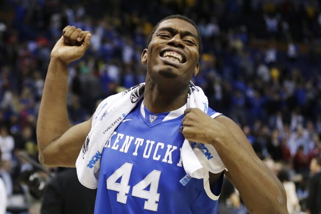 Kentucky center Dakari Johnson (44) celebrates after a third-round game against Wichita State at the NCAA college basketball tournament Sunday, March 23, 2014, in St. Louis. Kentucky won 78-76. (AP Photo/Charlie Riedel)