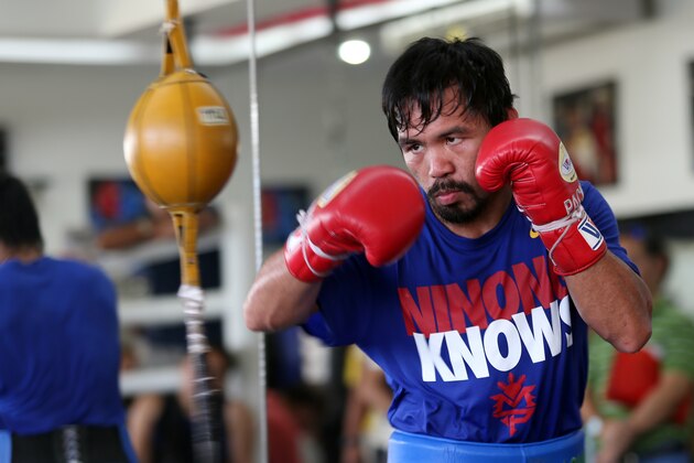 GENERAL SANTOS, PHILIPPINES - MARCH 04:  Manny Pacquiao takes part in a training session on March 4, 2014 in General Santos, Philippines. Pacquiao will fight for WBO welterweight championship rematch against Timothy Bradley on April 12, 2014 at the MGM Grand in Las Vegas, Nevada. (Photo by Jeoffrey Maitem/Getty Images)