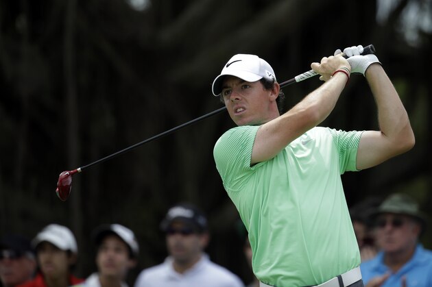 Rory McIlroy of Northern Ireland tees off on the fourth hole during the final round of the Cadillac Championship golf tournament Sunday, March 9, 2014, in Doral, Fla. (AP Photo/Lynne Sladky)