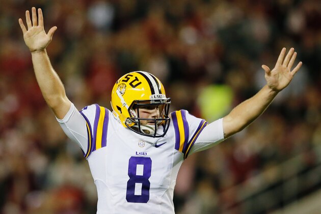TUSCALOOSA, AL - NOVEMBER 09:  Zach Mettenberger #8 of the LSU Tigers celebrates a second quarter touchdown against the Alabama Crimson Tide during the game at Bryant-Denny Stadium on November 9, 2013 in Tuscaloosa, Alabama.  (Photo by Kevin C. Cox/Getty Images)