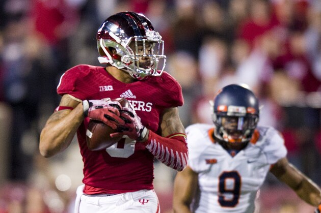 Indiana wide receiver Cody Latimer (3) checks over his shoulder as he rushes the ball into the end zone during an NCAA college football game, Saturday, Nov. 9, 2013, in Bloomington, Ind. Indiana defeated Illinois 52-35. (AP Photo/Doug McSchooler)