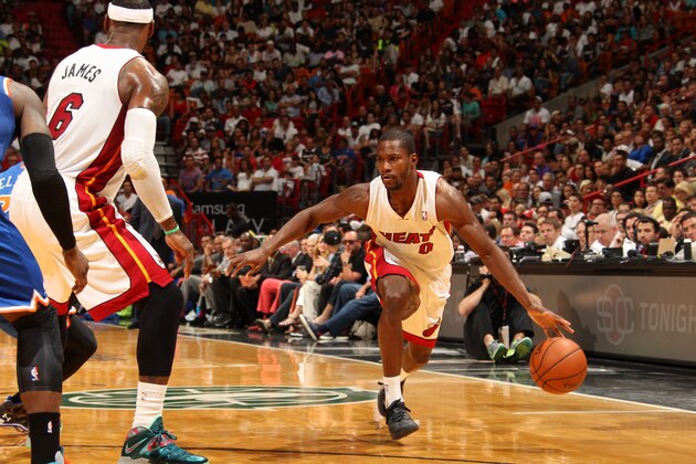 MIAMI, FL - April 6: Toney Douglas #0 of the Miami Heat dribbles the ball during the game against the New York Knicks at the American Airlines Arena in Miami, Florida on April 6, 2014. NOTE TO USER: User expressly acknowledges and agrees that, by downloading and/or using this photograph, user is consenting to the terms and conditions of the Getty Images License Agreement. Mandatory copyright notice: Copyright NBAE 2014 (Photo by Issac Baldizon/NBAE via Getty Images)