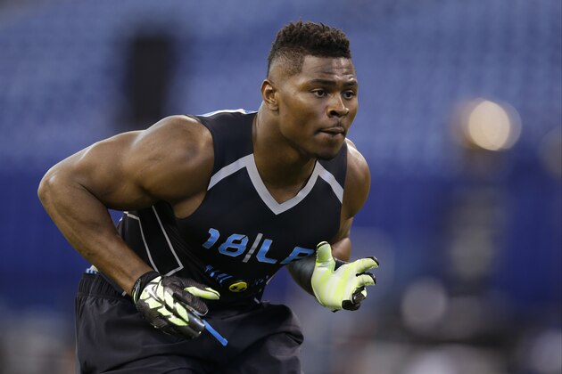 Buffalo linebacker Khalil Mack runs a drill at the NFL football scouting combine in Indianapolis, Monday, Feb. 24, 2014. (AP Photo/Michael Conroy)