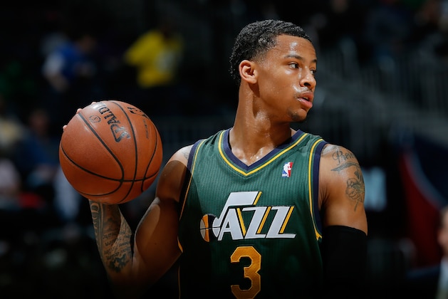 ATLANTA, GA - DECEMBER 20:  Trey Burke #3 of the Utah Jazz walks off the court during a timeout in the game against the Atlanta Hawks at Philips Arena on December 20, 2013 in Atlanta, Georgia.  NOTE TO USER: User expressly acknowledges and agrees that, by downloading and or using this photograph, User is consenting to the terms and conditions of the Getty Images License Agreement.  (Photo by Kevin C. Cox/Getty Images)