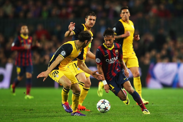 BARCELONA, SPAIN - APRIL 01: Neymar of Barcelona takes on Juanfran of Club Atletico de Madrid during the UEFA Champions League Quarter Final first leg match between FC Barcelona and Club Atletico de Madrid at Camp Nou on April 1, 2014 in Barcelona, Spain.  (Photo by Clive Rose/Getty Images)