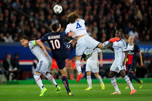 PARIS, FRANCE - APRIL 02:  Zlatan Ibrahimovic of PSG battles for a header with John Terry (L) and David Luiz (R) of Chelsea during the UEFA Champions League quarter final, first leg match between Paris Saint Germain and Chelsea at Parc des Princes on April 2, 2014 in Paris, France.  (Photo by Shaun Botterill/Getty Images)
