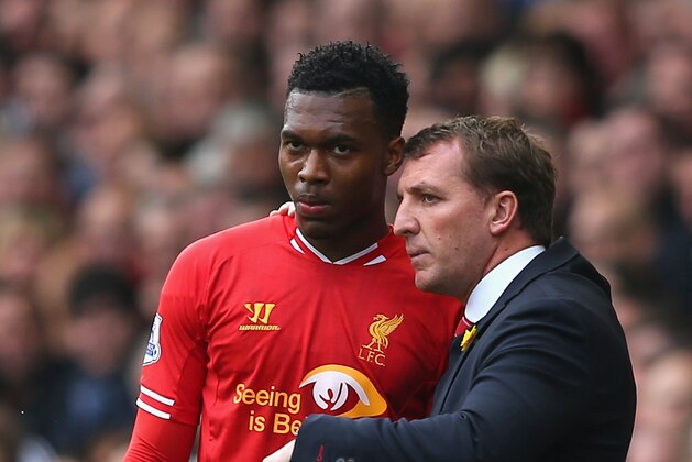 LIVERPOOL, ENGLAND - MARCH 30:  Liverpool Manager Brendan Rodgers speaks to Daniel Sturridge during the Barclays Premier League match between Liverpool and Tottenham Hotspur at Anfield on March 30, 2014 in Liverpool, England.  (Photo by Alex Livesey/Getty Images)