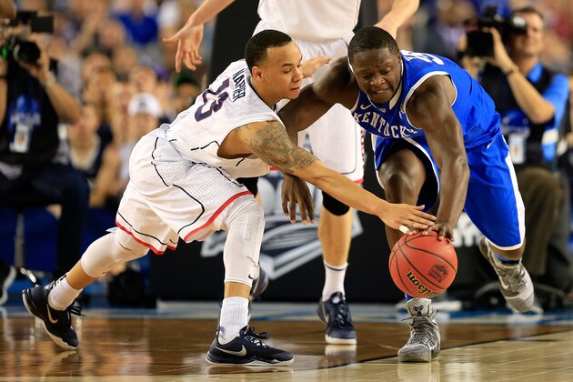 ARLINGTON, TX - APRIL 07:  Shabazz Napier #13 of the Connecticut Huskies and Julius Randle #30 of the Kentucky Wildcats battle for a loose ball during the NCAA Men's Final Four Championship at AT&T Stadium on April 7, 2014 in Arlington, Texas.  (Photo by Jamie Squire/Getty Images)