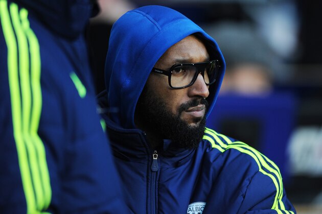 LONDON, ENGLAND - DECEMBER 26:  Nicolas Anelka of West Bromwich looks on from the sidelines during the Barclays Premier League match between Tottenham Hotspur and West Bromwich Albion on December 26 2013 in London, England.  (Photo by Steve Bardens/Getty Images)
