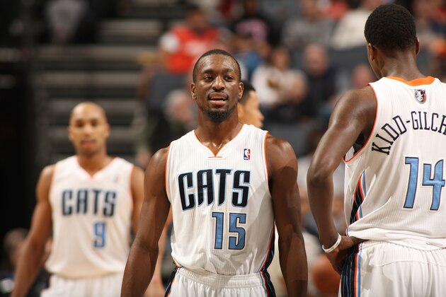 CHARLOTTE, NC - NOVEMBER 22: Kemba Walker #15 & Michael Kidd-Gilchrist #14 of the Charlotte Bobcats during the game against  the Phoenix Suns at the Time Warner Cable Arena on November 22, 2013 in Charlotte, North Carolina.  NOTE TO USER: User expressly acknowledges and agrees that, by downloading and or using this photograph, User is consenting to the terms and conditions of the Getty Images License Agreement.  Mandatory Copyright Notice:  Copyright 2013 NBAE (Photo by Kent Smith/NBAE via Getty Images)