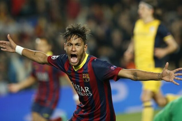 Barcelona's Neymar celebrates after scoring his sides first goal during a first leg quarterfinal Champions League soccer match between Barcelona and Atletico Madrid at the Camp Nou stadium in Barcelona, Spain, Tuesday April 1, 2014. (AP Photo/Emilio Morenatti)