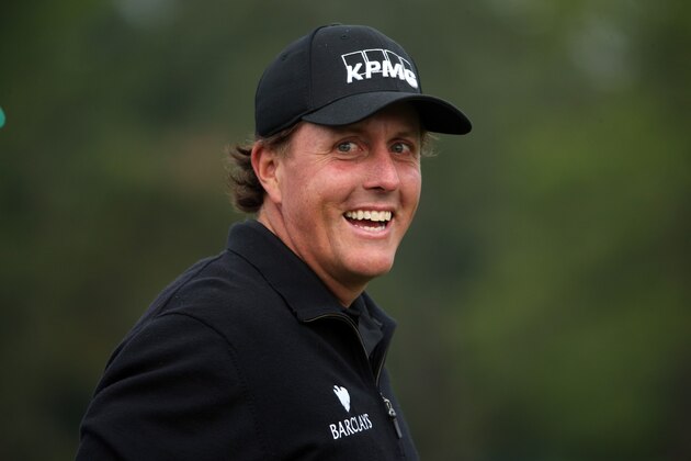 AUGUSTA, GA - APRIL 08:  Phil Mickelson of the United States waits on the putting green during a practice round prior to the start of the 2014 Masters Tournament at Augusta National Golf Club on April 8, 2014 in Augusta, Georgia.  (Photo by Andrew Redington/Getty Images)