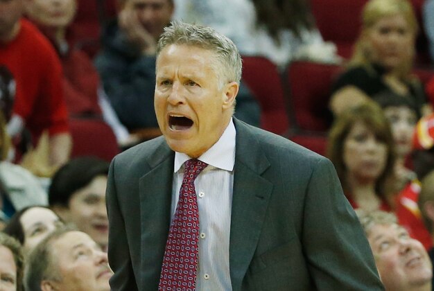 HOUSTON, TX - MARCH 27:  Head coach Brett Brown  of the Philadelphia 76ers reacts to a play during the game against the Houston Rockets at the Toyota Center on March 27, 2014 in Houston, Texas. NOTE TO USER: User expressly acknowledges and agrees that, by downloading and or using this photograph, User is consenting to the terms and conditions of the Getty Images License Agreement.  (Photo by Scott Halleran/Getty Images)