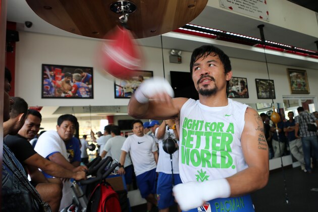 GENERAL SANTOS, PHILIPPINES - MARCH 04:  Manny Pacquiao takes part in a training session on March 4, 2014 in General Santos, Philippines. Pacquiao will fight for WBO welterweight championship rematch against Timothy Bradley on April 12, 2014 at the MGM Grand in Las Vegas, Nevada. (Photo by Jeoffrey Maitem/Getty Images)