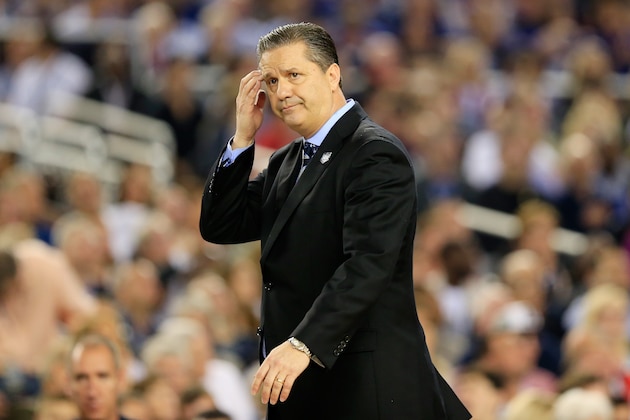 ARLINGTON, TX - APRIL 07: Head coach John Calipari of the Kentucky Wildcats reacts during the NCAA Men's Final Four Championship against the Connecticut Huskies at AT&T Stadium on April 7, 2014 in Arlington, Texas.  (Photo by Jamie Squire/Getty Images)